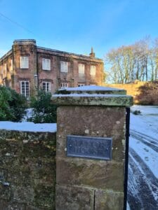 Manor House Cast Lead Plaque Roofing company